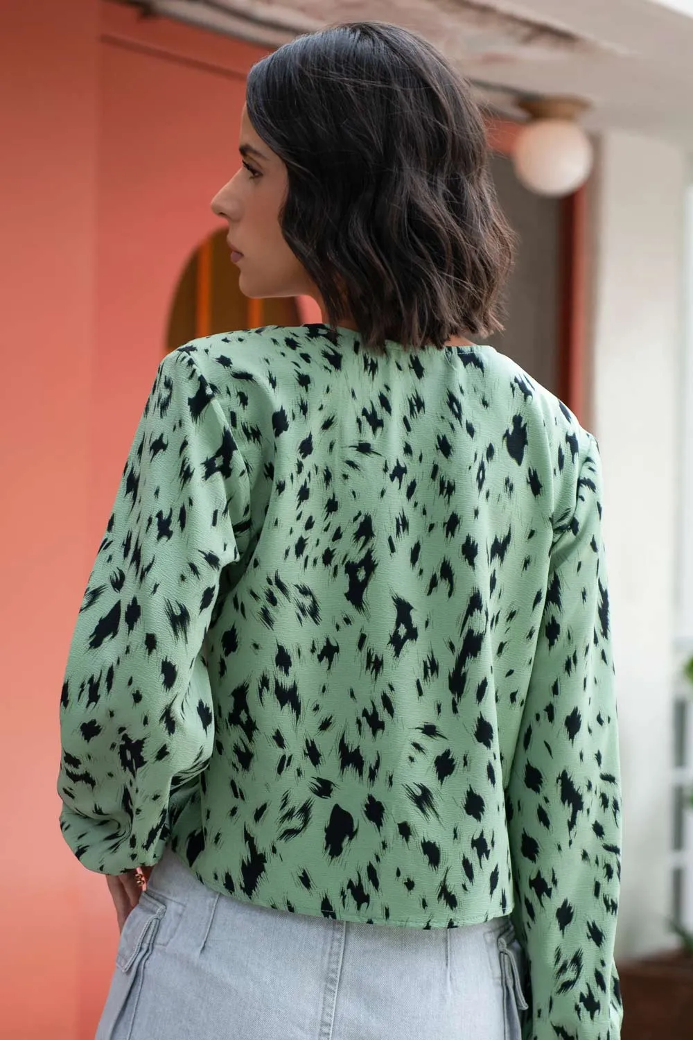 Blusa estampada de manga larga escote con lazos