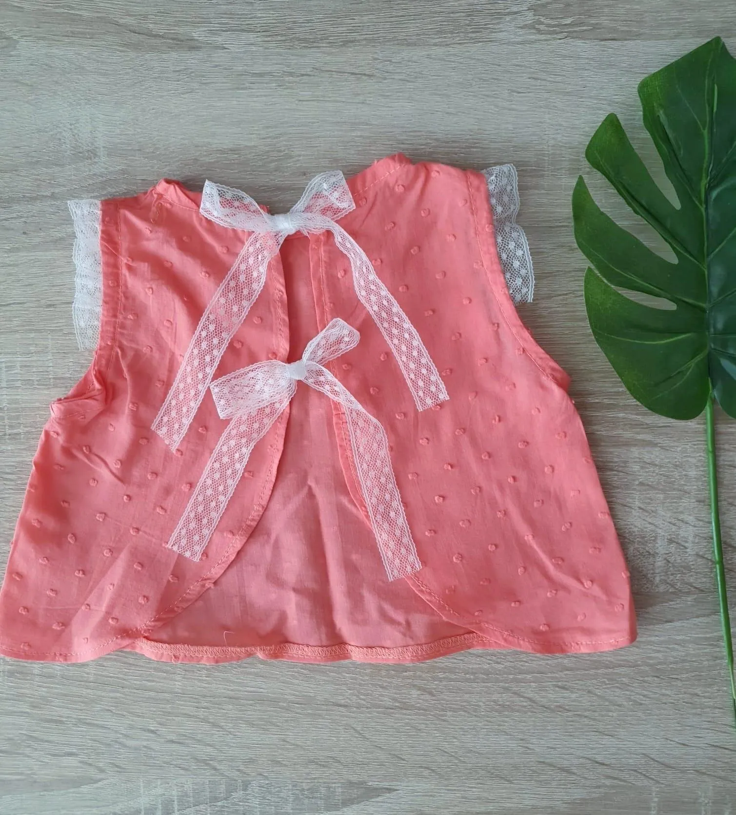 Coral blouse with bows