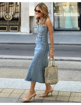 denim dress: A type of garment made from denim fabric, typically worn as a stylish and casual outfit.