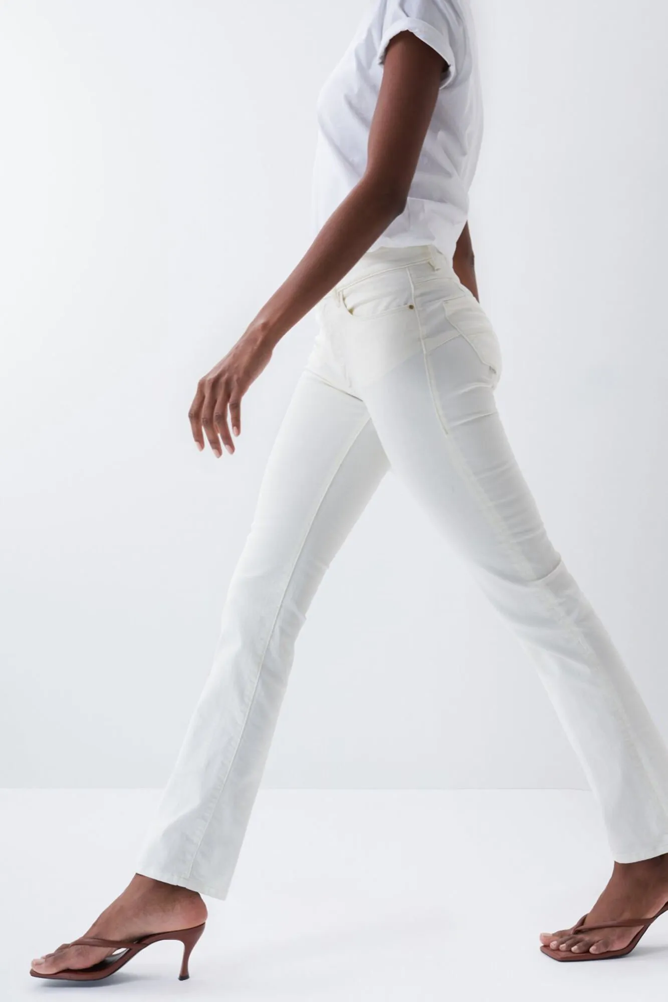 Ecru slim fit push-up jeans for women by Destiny.