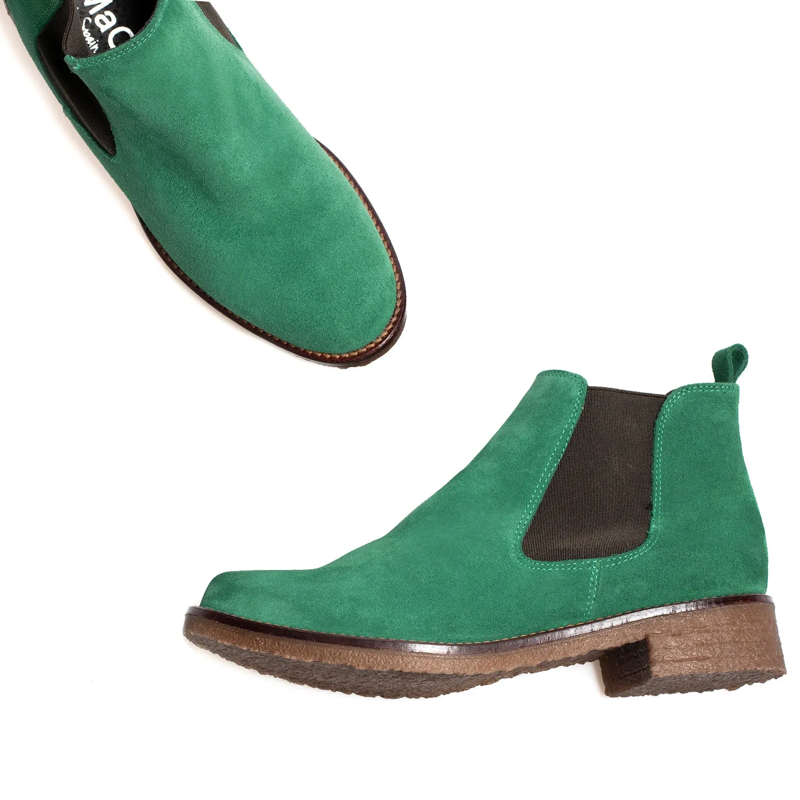 women's green leather Chelsea boots.